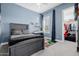 Spacious bedroom with a large bed and closet at 3538 E Hazeltine Way, Queen Creek, AZ 85142