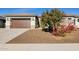 Beautiful home with a 2-car garage, landscaping, and a paved driveway at 3538 E Hazeltine Way, Queen Creek, AZ 85142