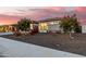Modern home exterior with landscaping and a walkway at 3538 E Hazeltine Way, Queen Creek, AZ 85142
