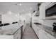 Modern kitchen with granite countertops and stainless steel appliances at 3538 E Hazeltine Way, Queen Creek, AZ 85142