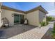 Relaxing patio area with wicker chairs and access to the interior at 3538 E Hazeltine Way, Queen Creek, AZ 85142