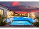 Inviting pool and spa with a grassy backyard at 3538 E Hazeltine Way, Queen Creek, AZ 85142
