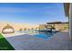 Modern pool and spa with a fire feature and patio at 3538 E Hazeltine Way, Queen Creek, AZ 85142