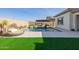 Stunning pool and spa with a circular daybed and fire feature at 3538 E Hazeltine Way, Queen Creek, AZ 85142