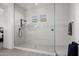 Walk-in shower with patterned tile and glass enclosure at 3538 E Hazeltine Way, Queen Creek, AZ 85142