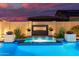 Relaxing spa with fire feature and blue lighting at 3538 E Hazeltine Way, Queen Creek, AZ 85142
