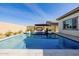 Spacious backyard with a large swimming pool, perfect for entertaining at 3538 E Hazeltine Way, Queen Creek, AZ 85142