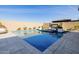 Relaxing backyard oasis featuring a sparkling pool and modern landscaping at 3538 E Hazeltine Way, Queen Creek, AZ 85142
