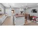 Open concept kitchen and living area with island at 38406 N 12Th Ave, Phoenix, AZ 85086