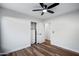 Bright bedroom with wood-look floors and built-in closet at 4443 E Thorn Tree Dr, Cave Creek, AZ 85331