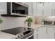 Modern kitchen features stainless steel appliances and white cabinetry at 5450 E Mclellan Rd # 204, Mesa, AZ 85205