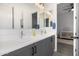 Modern bathroom with double vanity and patterned floor at 10243 E Seismic Ave, Mesa, AZ 85212