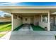 Attached carport with concrete flooring at 10801 W Clair Dr, Sun City, AZ 85351