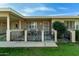 Front entry with wrought iron gate at 10801 W Clair Dr, Sun City, AZ 85351