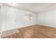 Bright living room with wood-look floors at 10801 W Clair Dr, Sun City, AZ 85351