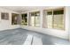 Sunroom with ample natural light and view of backyard at 10801 W Clair Dr, Sun City, AZ 85351