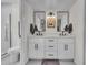 Modern bathroom with double vanity,hexagon tile floors and walk-in shower at 11229 N 23Rd Pl, Phoenix, AZ 85028