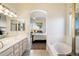 Bathroom with double vanity and large soaking tub at 16108 E Andrew Dr, Fountain Hills, AZ 85268