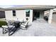 Backyard patio with fire pit and seating at 18157 W Foothill Dr, Surprise, AZ 85387