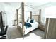 Main bedroom with canopy bed and dresser at 18157 W Foothill Dr, Surprise, AZ 85387