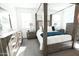 Main bedroom with canopy bed and dresser at 18157 W Foothill Dr, Surprise, AZ 85387