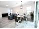 Dining room with glass table and six chairs at 18157 W Foothill Dr, Surprise, AZ 85387