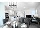 Dining area with adjacent kitchen and living room at 18157 W Foothill Dr, Surprise, AZ 85387