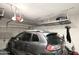 Garage with overhead storage and car at 18157 W Foothill Dr, Surprise, AZ 85387