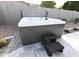 Modern hot tub with steps for easy access at 18157 W Foothill Dr, Surprise, AZ 85387