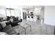 Open living room with kitchen and island at 18157 W Foothill Dr, Surprise, AZ 85387