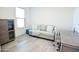 Bright office with sofa, desk and cabinet at 18157 W Foothill Dr, Surprise, AZ 85387