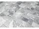 Gray tile flooring on the back patio at 18157 W Foothill Dr, Surprise, AZ 85387