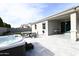 Spacious patio with hot tub and seating area at 18157 W Foothill Dr, Surprise, AZ 85387