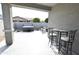 Covered patio with hot tub and seating at 18157 W Foothill Dr, Surprise, AZ 85387