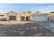 Single-story home with a two-car garage and desert landscaping at 18831 N 36Th St, Phoenix, AZ 85050