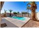 Inviting backyard pool with surrounding landscaping at 2706 S Ananea St, Mesa, AZ 85209