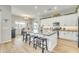 Modern kitchen featuring white cabinets, a large island, and stainless steel appliances at 28204 N Royce Rd, Queen Creek, AZ 85144