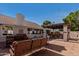 Relaxing backyard patio with seating area and pergola at 2854 E Mallory St, Mesa, AZ 85213
