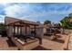 Spacious backyard with patio, garden, and pergola at 2854 E Mallory St, Mesa, AZ 85213