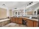 Spacious bathroom with double sinks, granite counters, and a large soaking tub at 2854 E Mallory St, Mesa, AZ 85213