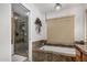 Clean bathroom with a walk-in shower and granite vanity at 2854 E Mallory St, Mesa, AZ 85213