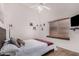 Cozy bedroom with a queen-size bed and a window seat at 2854 E Mallory St, Mesa, AZ 85213
