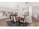 Elegant dining room with a spacious table and plenty of natural light at 2854 E Mallory St, Mesa, AZ 85213