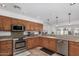 Kitchen with stainless steel appliances and ample cabinet space at 2854 E Mallory St, Mesa, AZ 85213