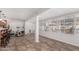 Kitchen features a sunroom, tile floors, and wood cabinets at 2854 E Mallory St, Mesa, AZ 85213