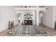 Spacious living room with high ceilings, neutral decor, and tiled floors at 2854 E Mallory St, Mesa, AZ 85213