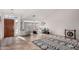 Open living room featuring neutral-toned furniture and a large area rug at 2854 E Mallory St, Mesa, AZ 85213
