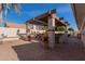 Covered patio with built-in bar and seating area at 2854 E Mallory St, Mesa, AZ 85213