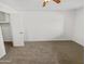 Spacious bedroom with neutral carpeting and ample closet space at 3344 W Oraibi Dr, Phoenix, AZ 85027