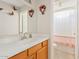 Neat bathroom with single sink vanity and shower stall at 3668 E Los Altos Rd, Gilbert, AZ 85297